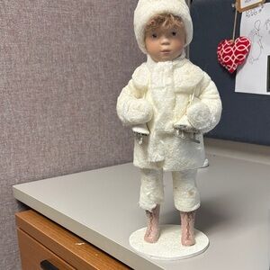 Elegant Winter Doll in Cream Attire with Skates